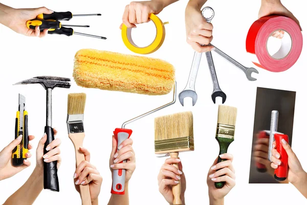 Mãos com ferramentas — Fotografia de Stock