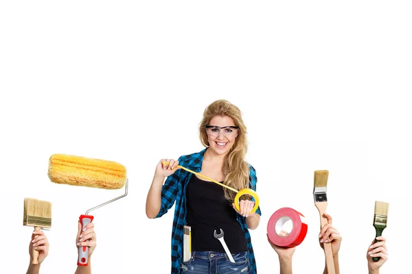Blonde girl with construction tools — Stock Photo, Image