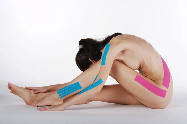 Female body with Kinesio tape — Stock Photo, Image