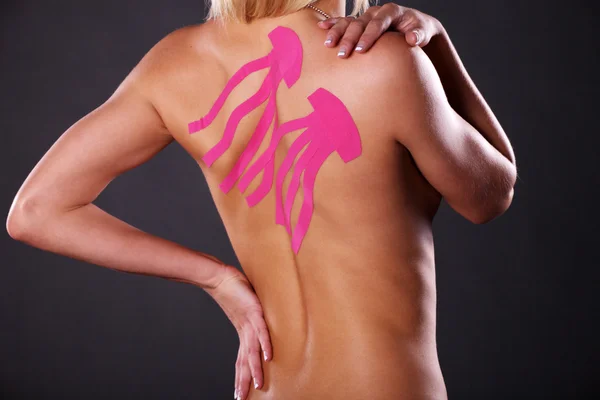 Female body with Kinesio tape — Stock Photo, Image