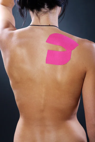 Female body with Kinesio tape — Stock Photo, Image