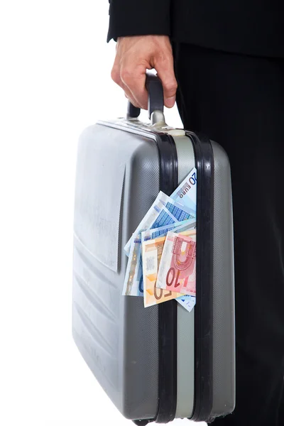 Man carrying briefcase full of money — Stock Photo, Image