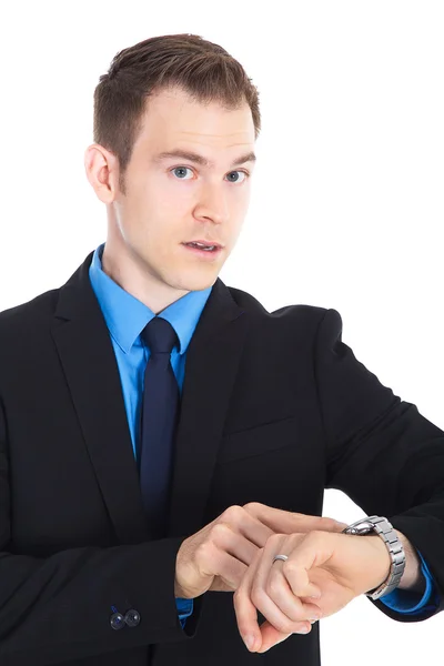 Businessman in business suit looking at his watch — Stock Photo, Image