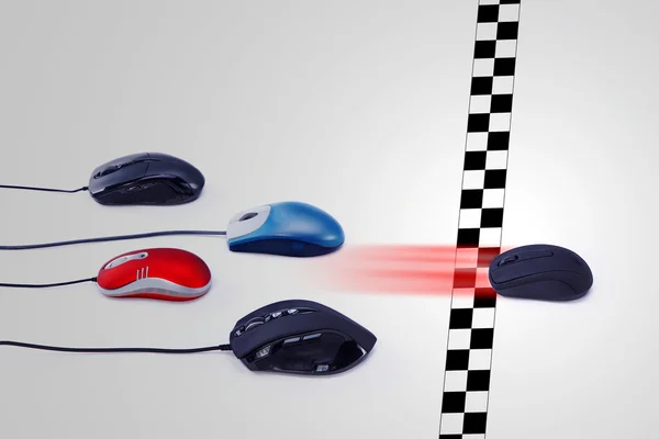 Race computer mouse, wireless mouse wins — Stock Photo, Image