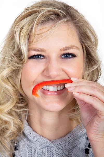 Blonde girl with pepper — Stock Photo, Image