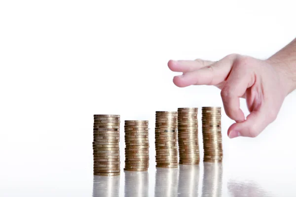 The Domino Principle with coins — Stock Photo, Image