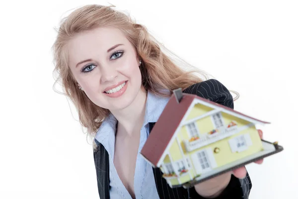 Real estate agent with miniature house — Stock Photo, Image