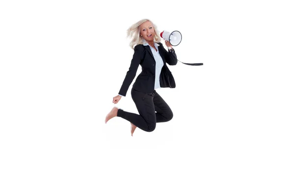 Businesswomen jumping with megaphone — Stock Photo, Image