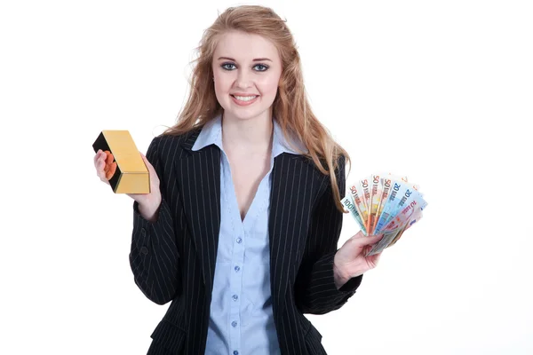 Femme d'affaires avec de l'or et de l'argent — Photo