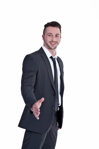 Businessman holds out his hand — Stock Photo, Image