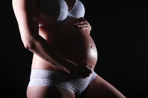 Gravid kvinna i underkläder — Stockfoto