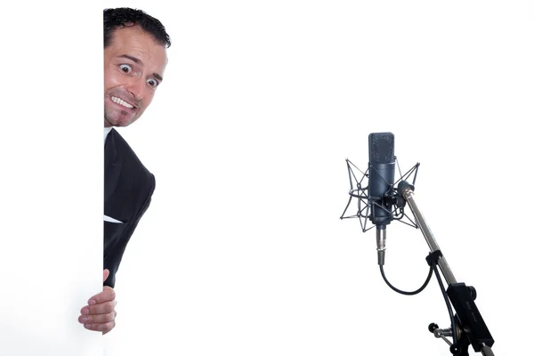 Singer afraid a microphone Royalty Free Stock Photos