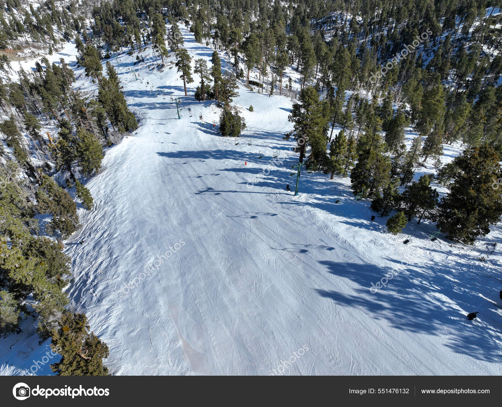 Aerial view of mountain ski resort with beautiful winter landscape