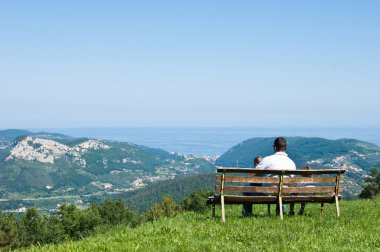 Bench with father and son clipart