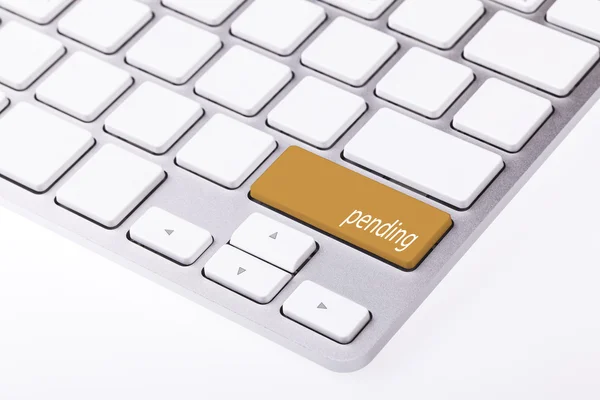 Клавіатура з помаранчевою кнопкою — стокове фото