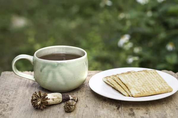 Cup of tea on wooden table — Stock Photo, Image