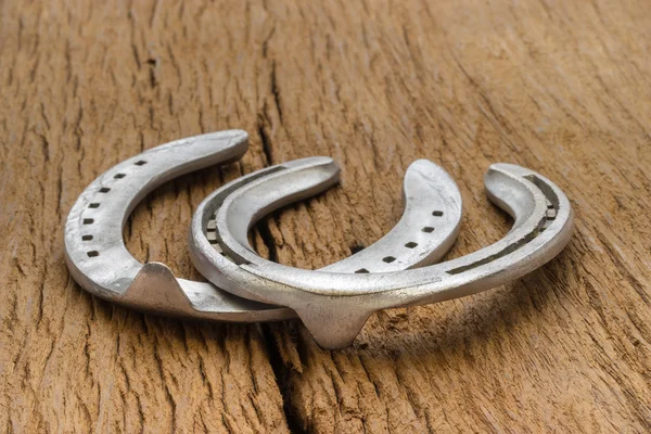 Horse shoes on wood — Stock Photo © worac #41516315
