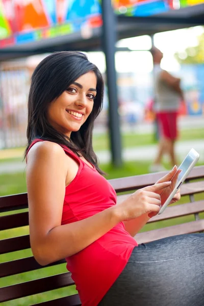Pretty girl with touchscreen tablet — Stock Photo, Image