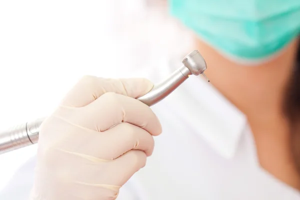 Dentist with dental drill — Stock Photo, Image