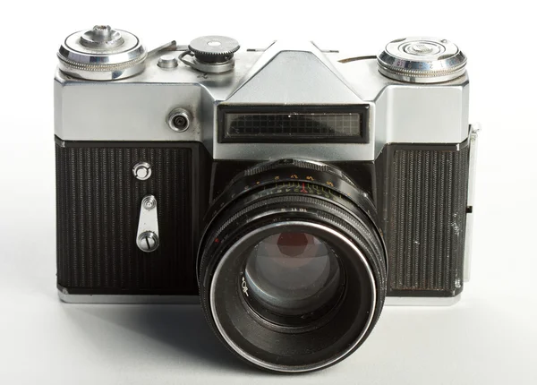 The frontal view of an old and dusty russian Zenit camera on film with lens. — Stock Photo, Image