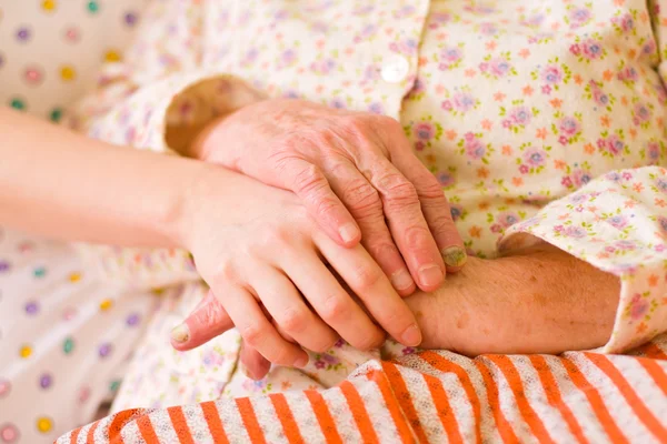 Caring hands - helping the needy — Stock Photo, Image