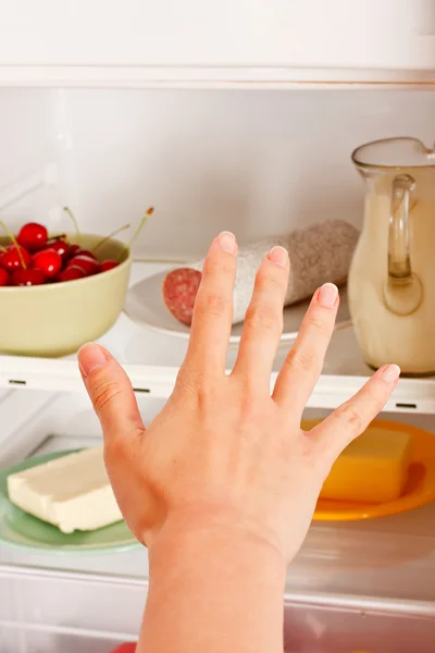 Reaching for food — Stock Photo, Image
