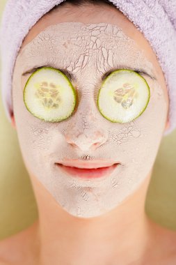 Relaxing At Spa With Facial Mask clipart