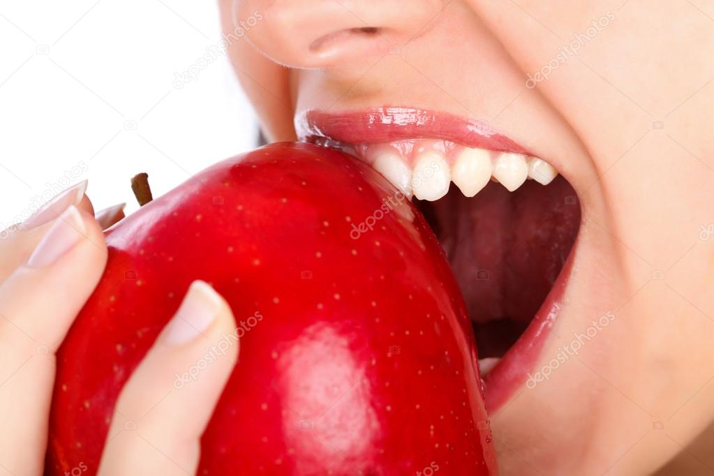 Woman Biting Red Apple