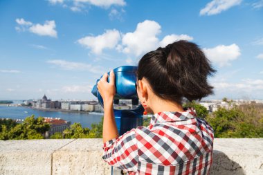 Tourist looking at cityscape
