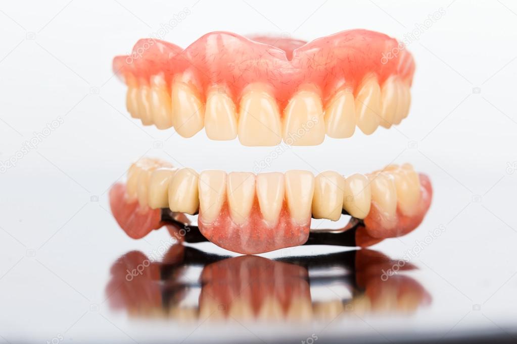 Upper and lower dental prosthesis