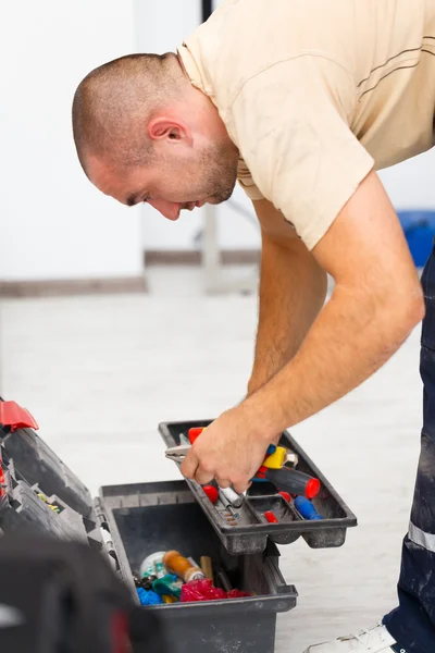 Handyman e seu saco de ferramentas — Fotografia de Stock