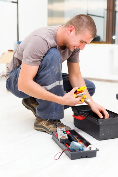 Service man met zijn toolbox — Stockfoto