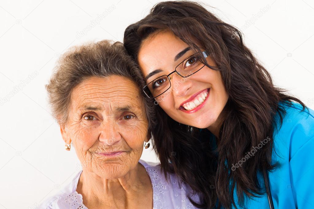 Doctor caring about elderly grandmother