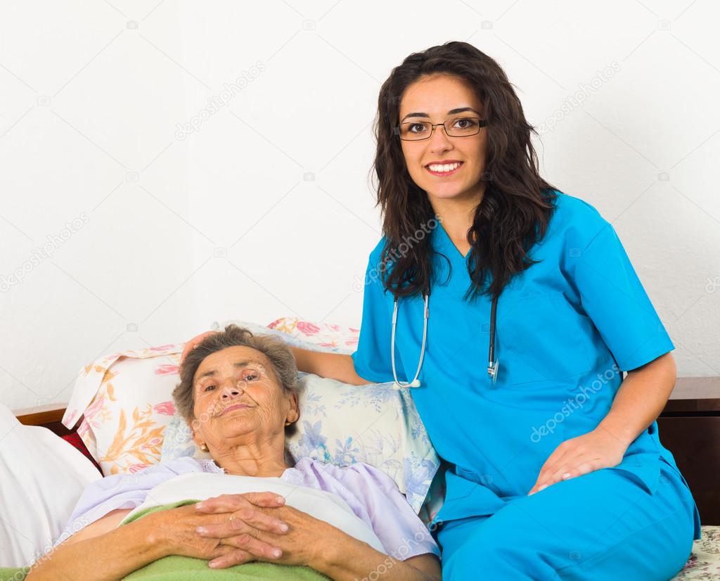 Nurse caring about elder patient
