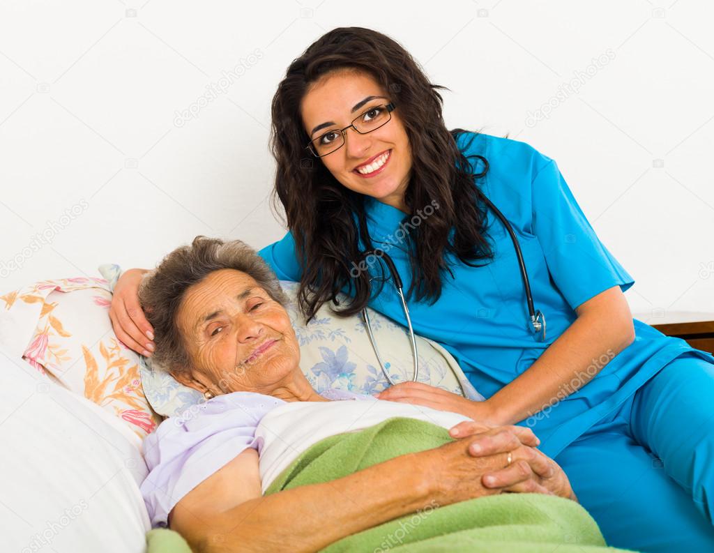 Nurse caring for elder patient