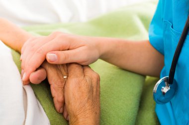 Nurse helping elderly lady clipart