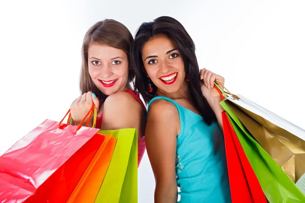 Mulheres juntas segurando sacos de compras — Fotografia de Stock