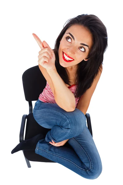 Woman pointing upwards a blank space — Stock Photo, Image