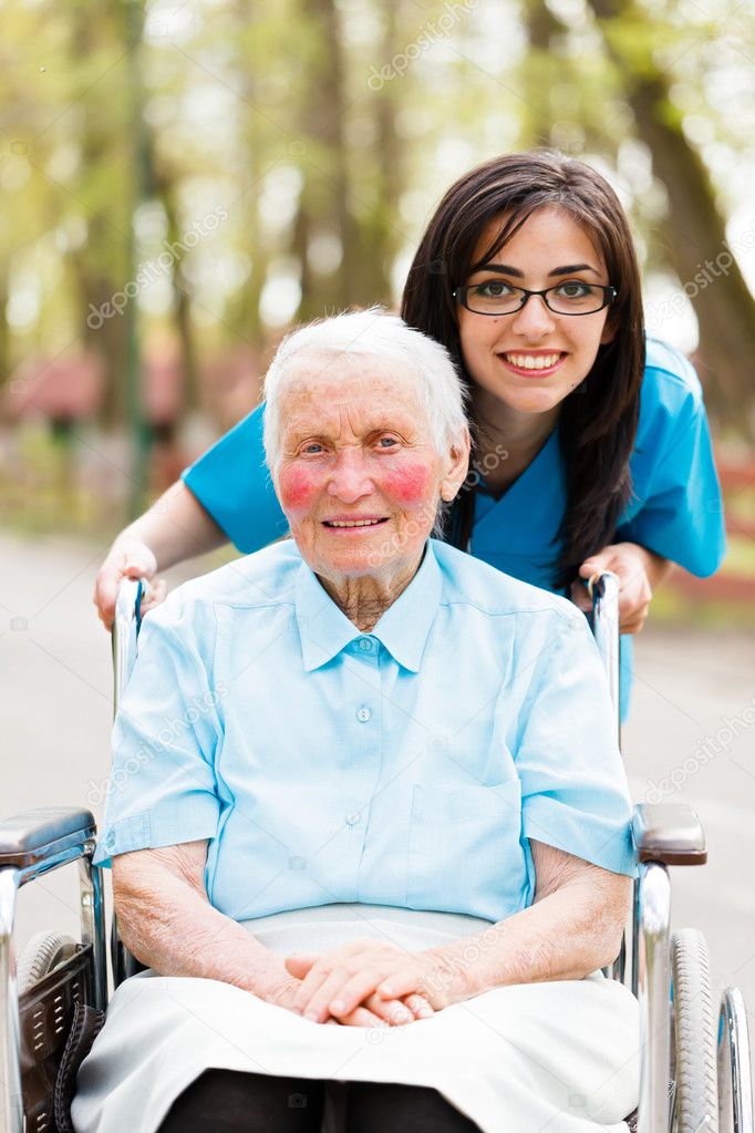 Kind Nurse and Elderly Lady