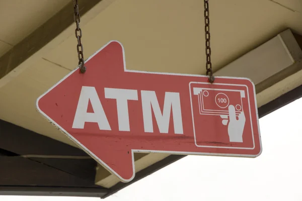 Arrow shaped ATM sign — Stock Photo, Image