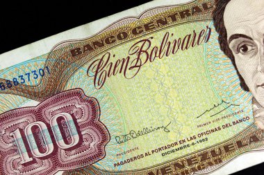 Old note of one hundred Bolivares clipart