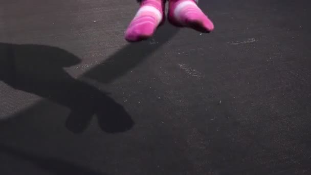 Young girl on a trampoline — Stock Video