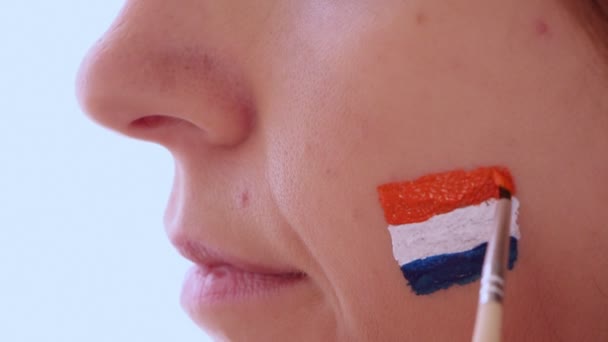 Face painting flag of Netherlands — Stock Video