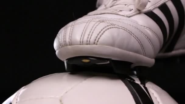 Football, soccer player shoe and ball, close up — Stock Video