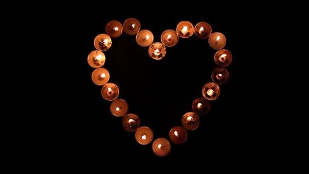 Heart shape made of candles — Stock Video