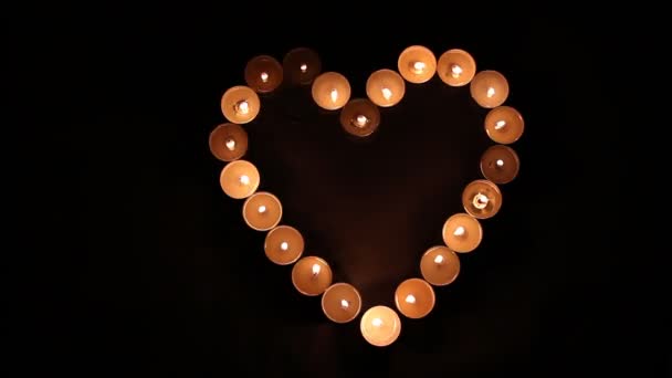 Heart shape made of candles — Stock Video