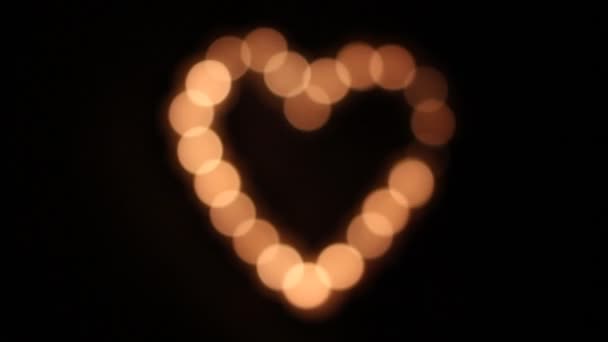 tvaru srdce ze svíček