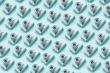Photography background with repetition of identical cameras on color background. High quality photo