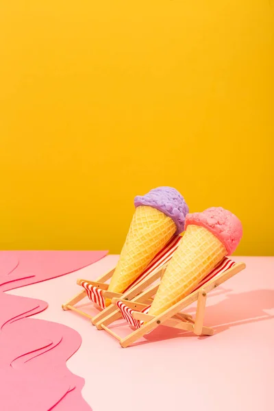 Ice cream in a hammock on a colored background, relaxation concept. High quality photo