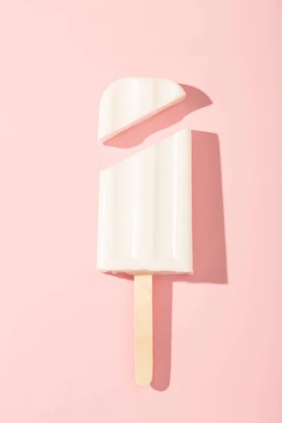 Vanilla ice cream on a stick on a pink background. Vector illustration. High quality photo